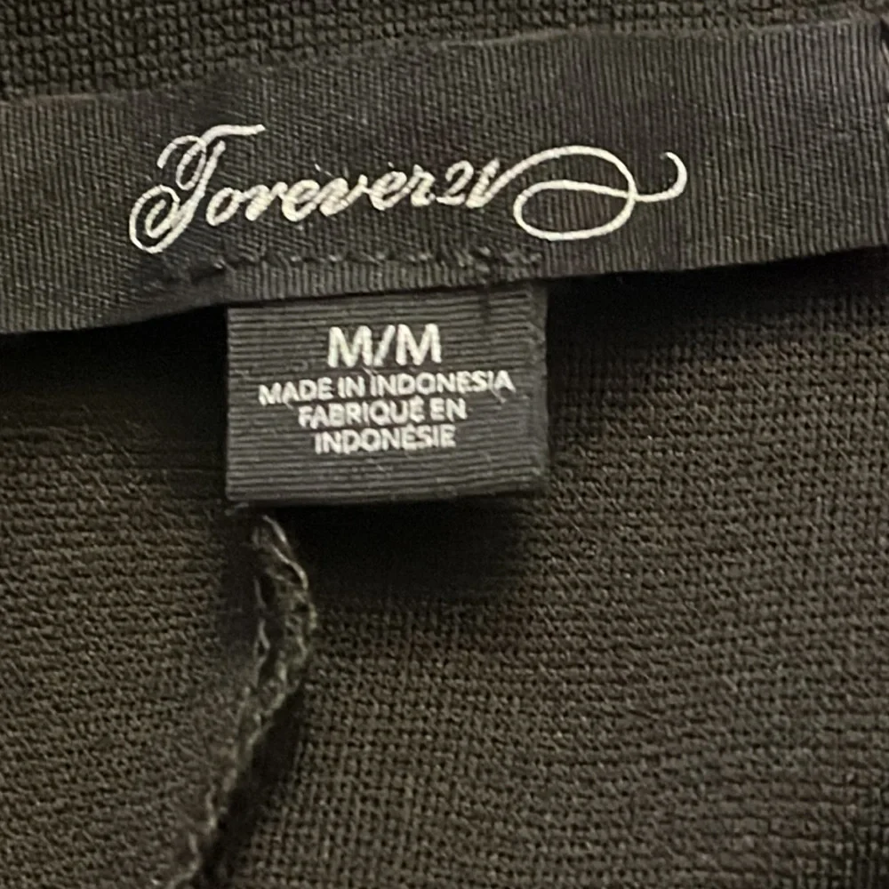 FOREVER 21 vintage knee-length black skirt. Size M - Picture 4 of 8